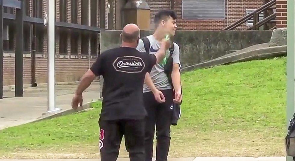 Parents in Tennessee seen spraying kids down with disinfectant after school official self-quarantines