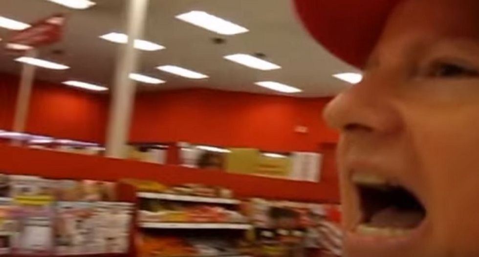 WATCH: Trans-hating preacher hollers at Target shoppers about Lucifer -- and they laugh in her face