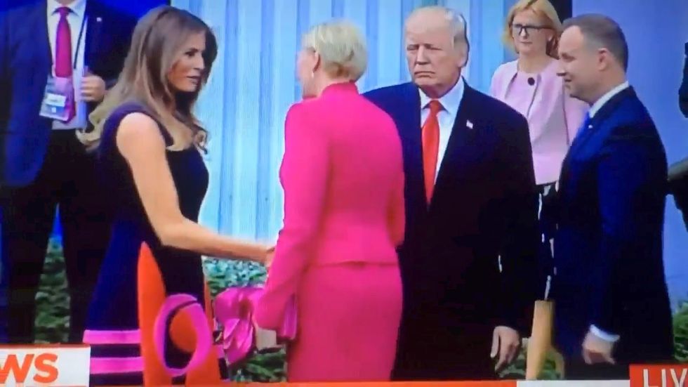 Donald Trump did shake the hand of Polish president's wife despite original reports