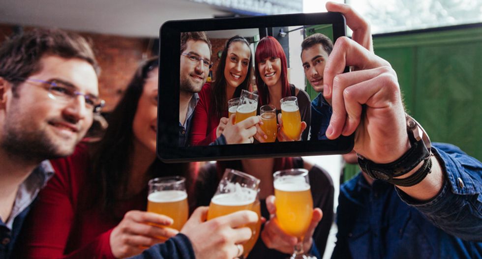 How social media brainwashes millennials into buying more expensive booze to impress their friends