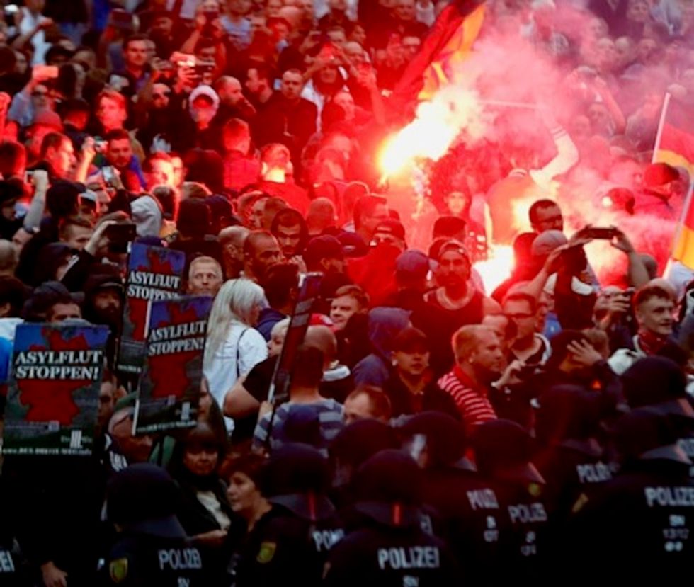 German officials promise crackdown on neo-Nazis after violent anti-immigrant protests