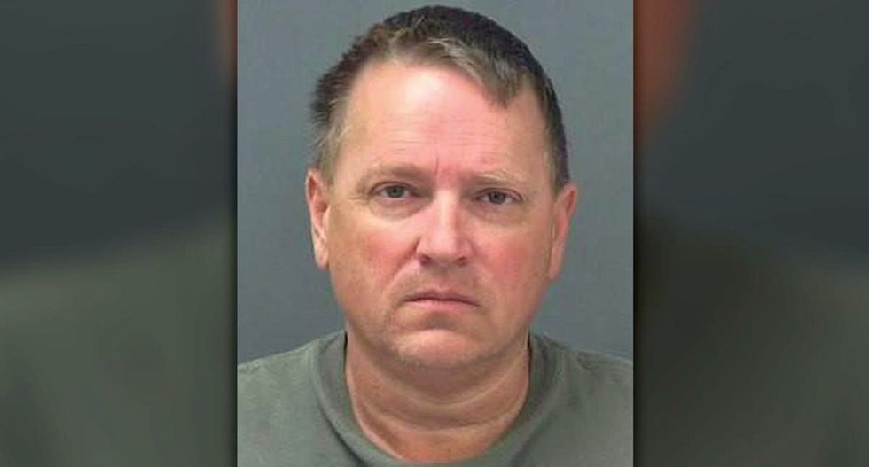 Police hunt gunman who killed three in Alabama trailer park