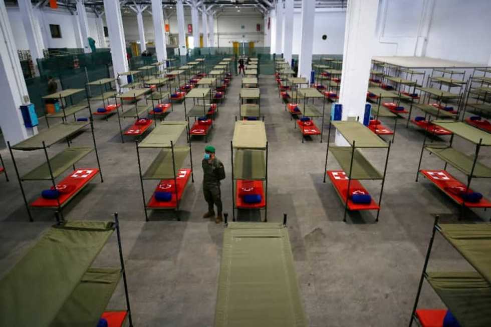 World leaders to hold crisis talks as virus toll tops 21,000