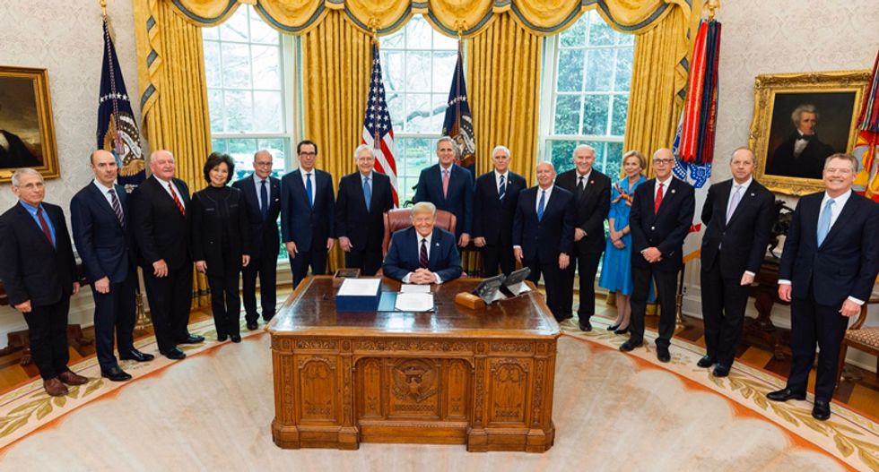 Internet mocks Trump's social distancing fail at stimulus signing: 'Not even trying to follow the CDC'