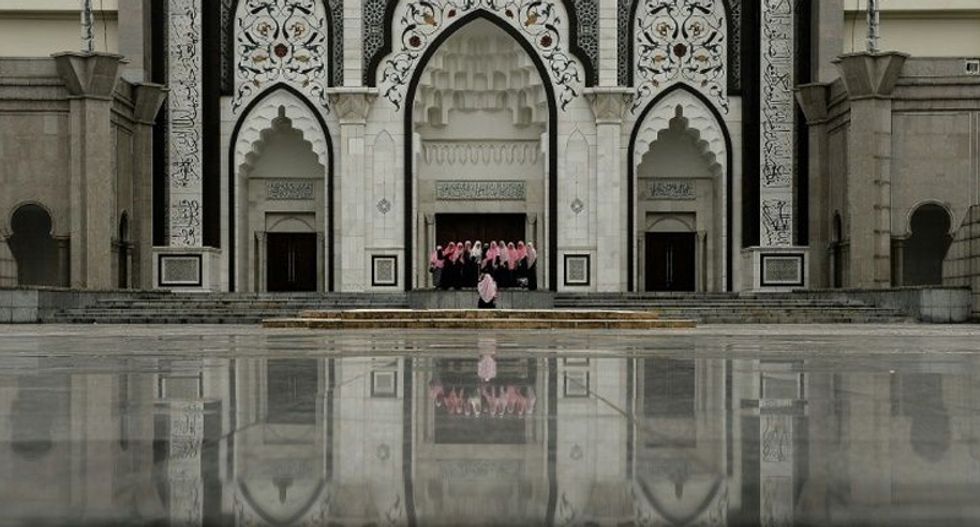 Two Malaysian women caned under Islamic law after being accused of lesbian sex