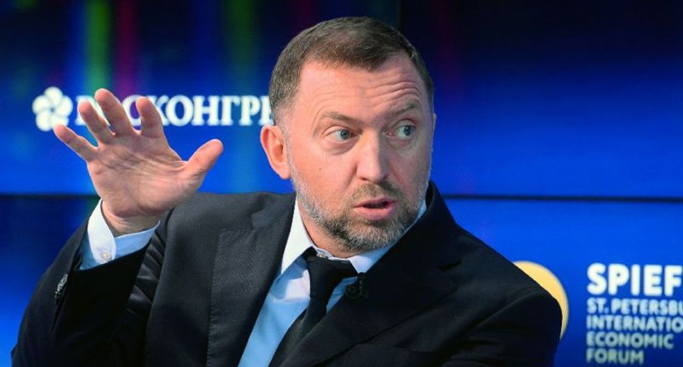 Trump on Sunday lifts sanctions on businesses linked to Russian oligarch tied to Manafort
