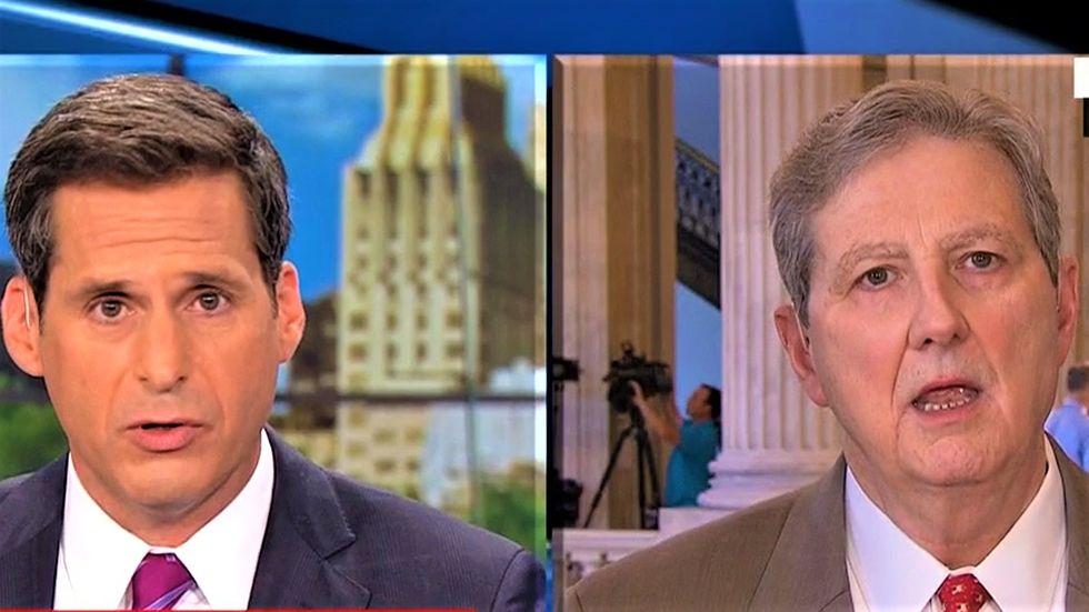 CNN's John Berman makes GOP senator squirm for refusing to condemn Trump's latest attack on the DOJ