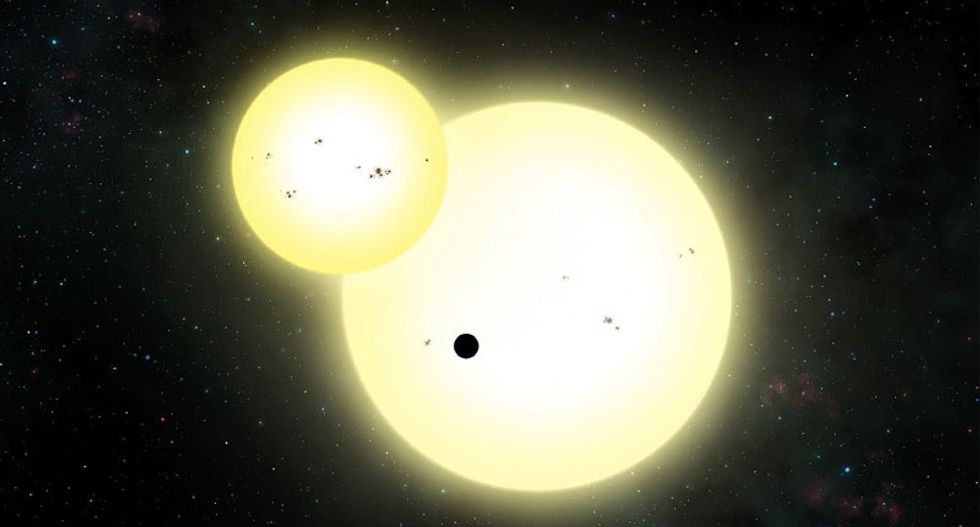 Scientists discover giant 'potentially habitable' new planet orbiting two suns