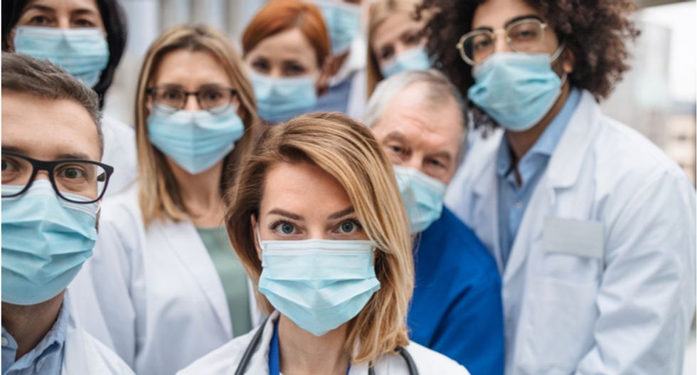 Hospitals are threatening to fire doctors who speak out about poor working conditions amid coronavirus outbreak