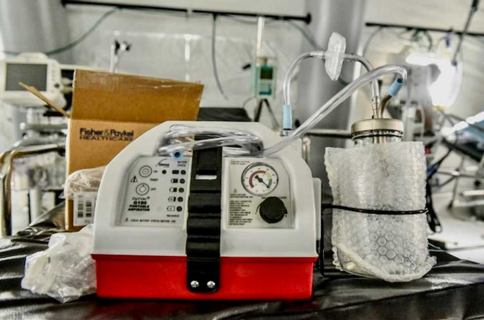 Auto industry races to make ventilators during virus crisis