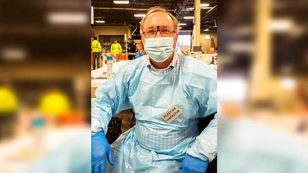 Wisconsin GOPer poses in full protective gear at polling place after pushing to keep churches open during pandemic