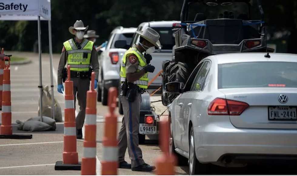 On Texas-Louisiana border, vehicle checkpoints put the brakes on coronavirus