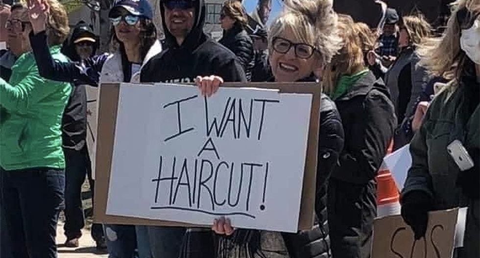 'Social distancing = Communism': These are the stupidest protest signs from rallies to reopen