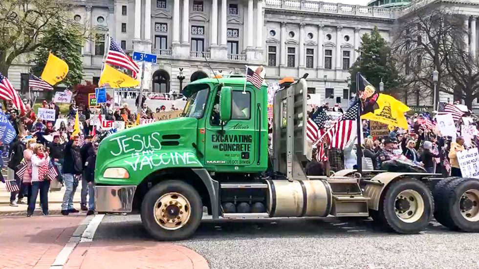 'Jesus is my vaccine': Hundreds of protesters gather without protective gear in Pennsylvania