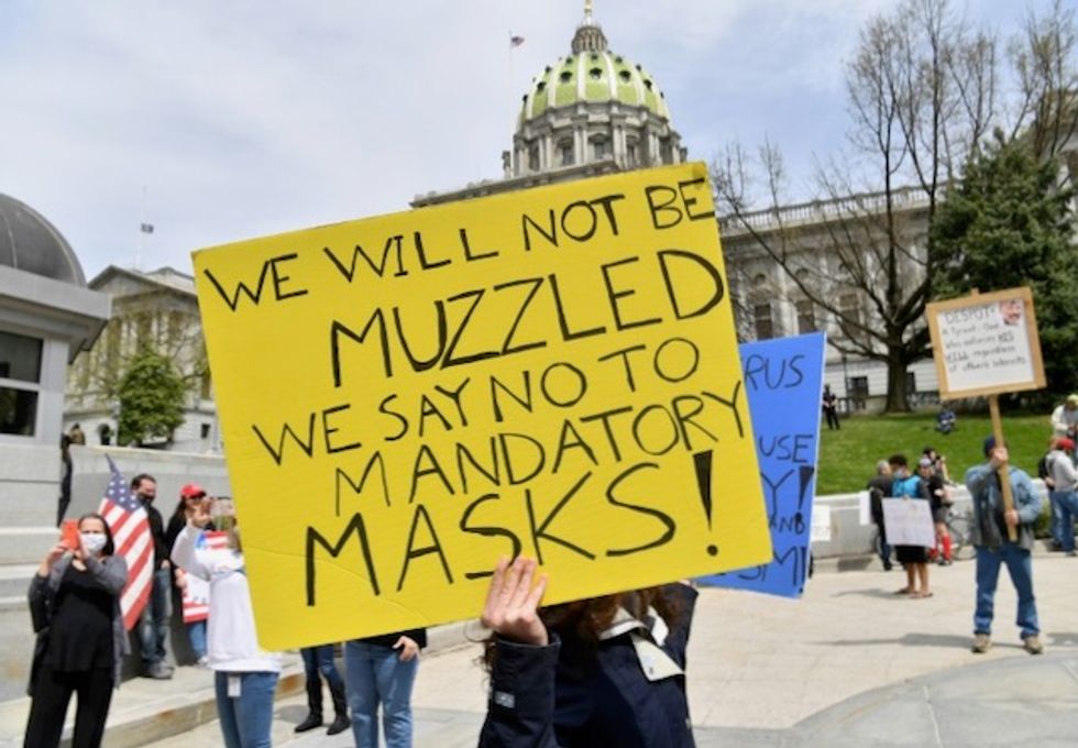 COVID-19 lockdown protests fueled by ‘scam artist’ brothers who exploit conservative outrage: report