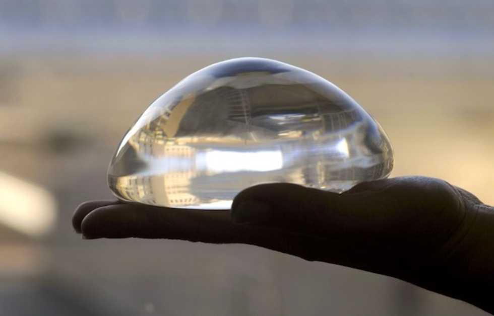 Breast implants saved woman shot in chest