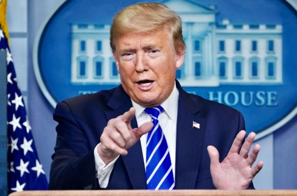 Trump says he is requiring everyone in the White House to wear a mask — even though he won't wear one himself