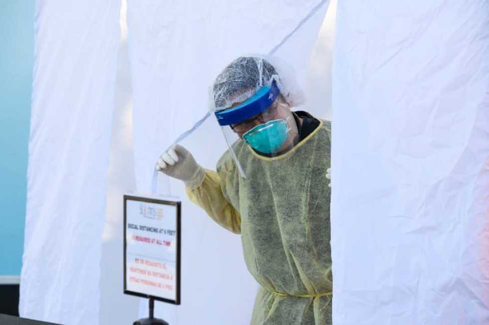 US virus cases hit a million as Germans wear masks in shops