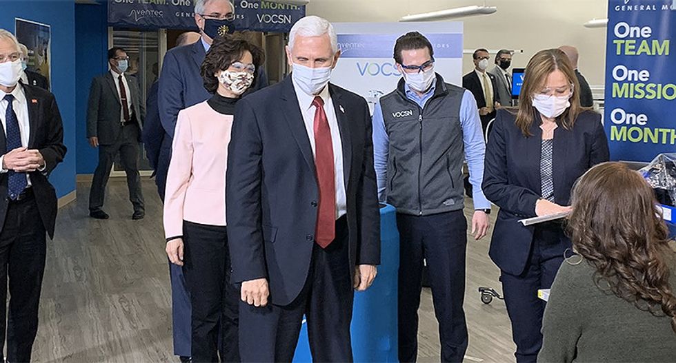 Pence dons a mask for GM event after facing a brutal backlash for wandering around the Mayo Clinic without one