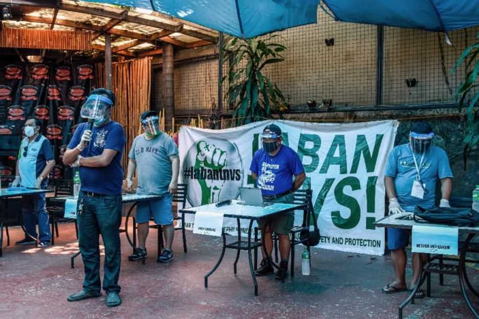 Virus lockdowns scale back May Day rallies