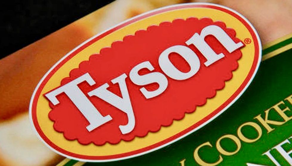 Calls to break up 'Big Meat' as nearly 900 workers at single Tyson processing plant test positive for Covid-19