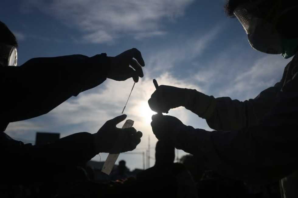 Virus deaths top 250,000 as billions pledged for vaccine push
