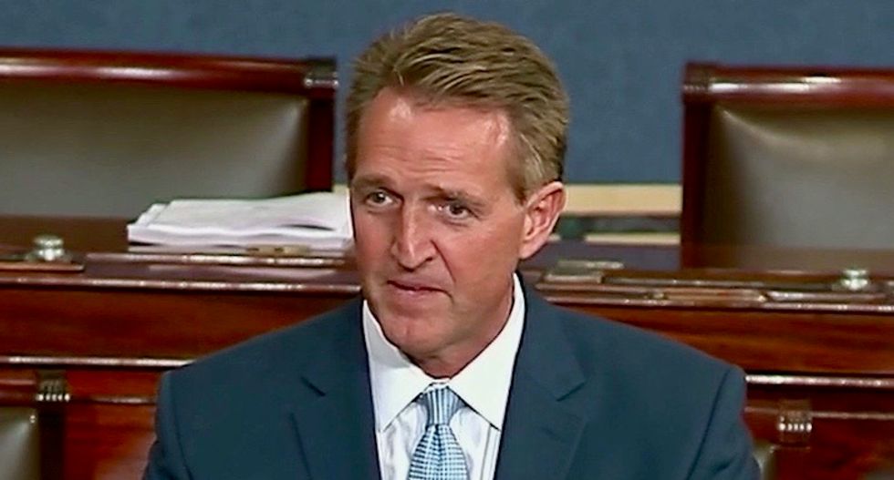 Jeff Flake blames 'all sides' after bombs target prominent Democrats