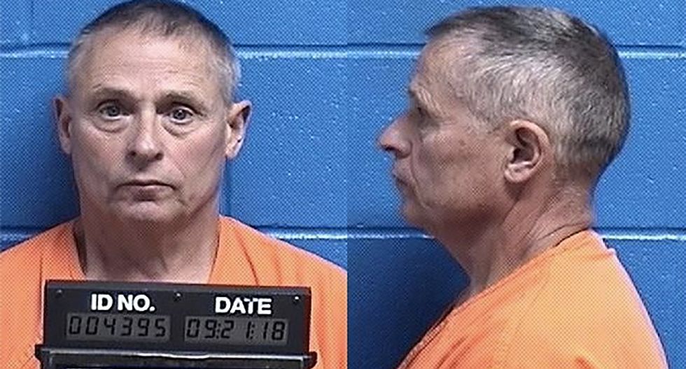 Tea party leader charged with distributing explosives, possessing illegal machine gun parts and other weapons