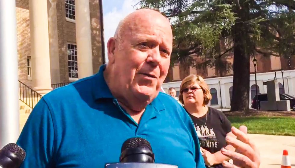 WATCH: Confederacy fan insists the flag isn't racist -- then launches racist rant against MLK