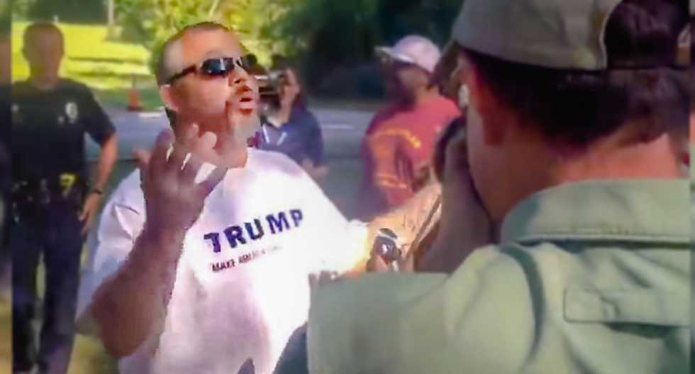 WATCH: Angry pro-Confederate protester asks for help spelling 'Do your research!' message to liberals