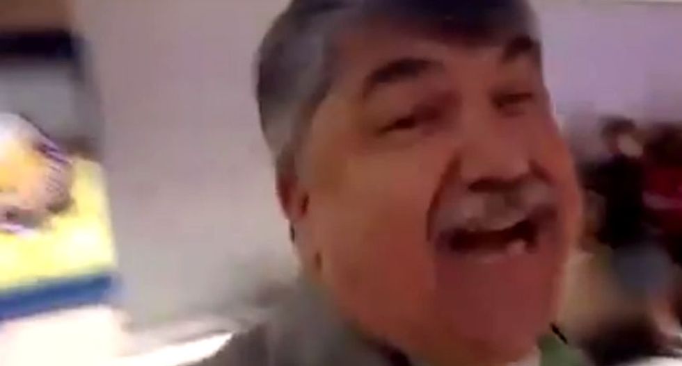 AFL-CIO president swats journalist in the face with a sign for asking tough questions at the DNC