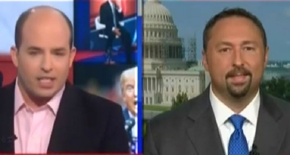 CNN host blasts Trump spokesman for robot-like 'radical Islamic terrorism' response about Khans