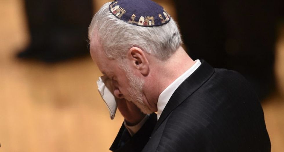 Mourners come together for emotional vigil for victims of Pittsburgh synagogue attack