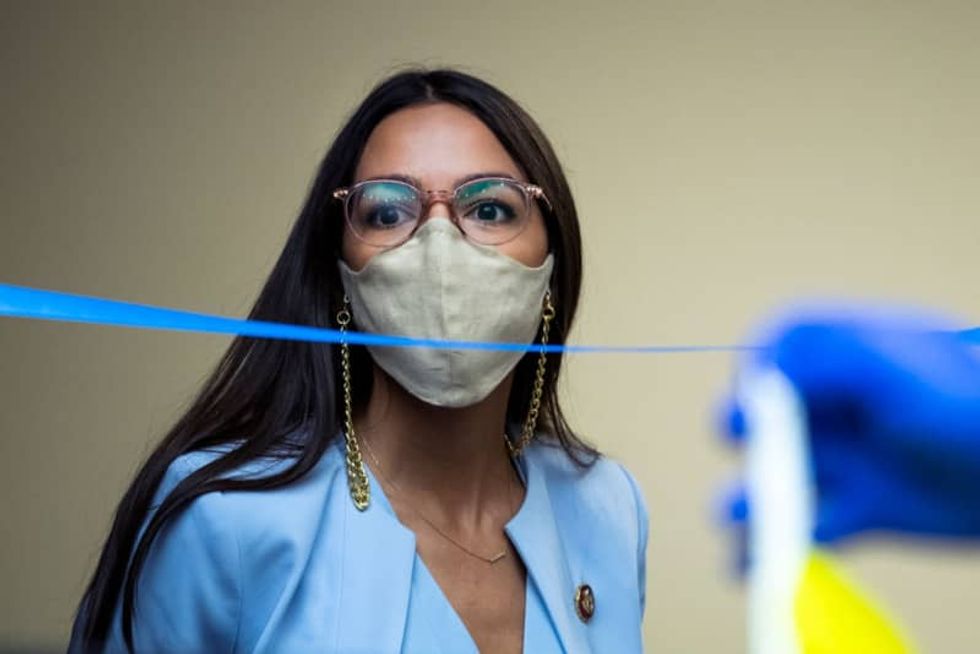 Ocasio-Cortez mocks Trump for writing off $70,000 in hair styling on taxes — after she was ridiculed for $250 haircut