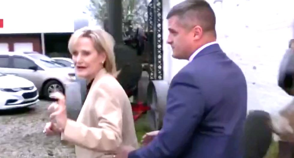 WATCH: Republican Cindy Hyde-Smith scurries away from reporters to avoid explaining her racist remarks