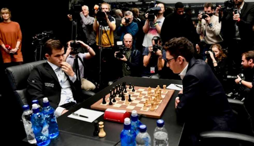 Norway's Magnus Carlsen beats US hopeful Fabiano Caruana in chess title decider