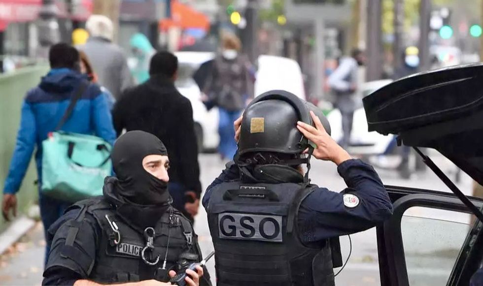 Two suspects detained over knife attack outside Charlie Hebdo’s former office in Paris