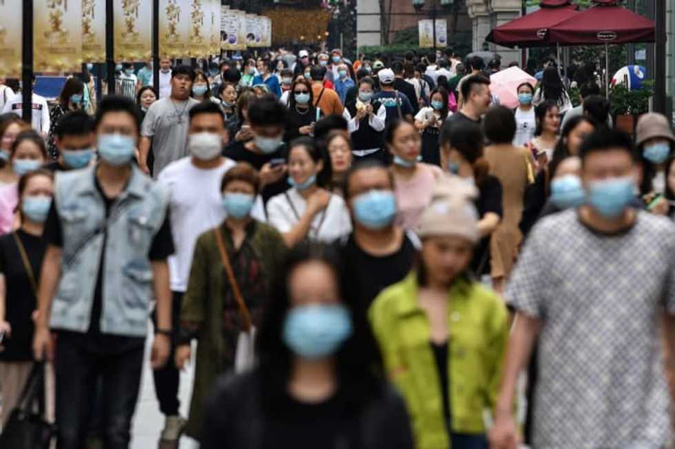 Virus curfew to be lifted in Australia as global deaths near a million