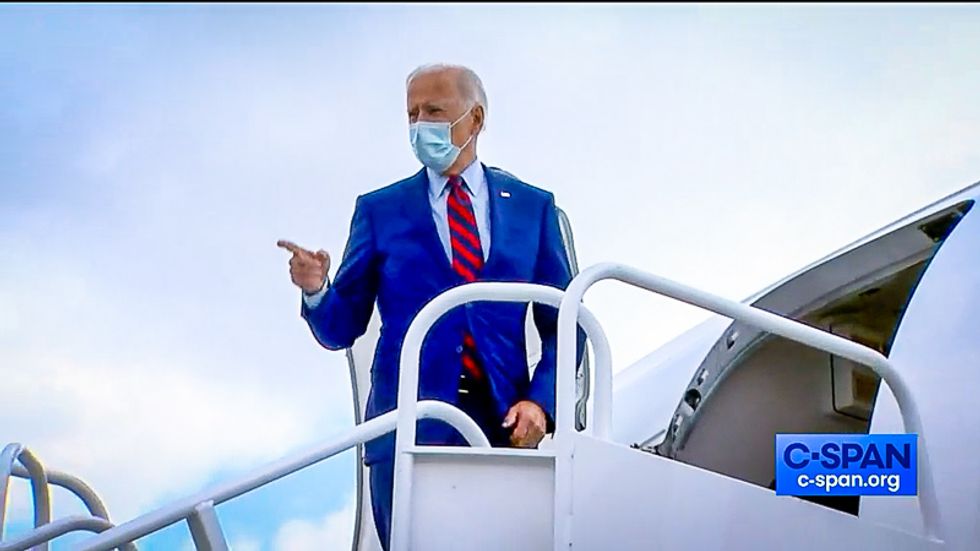 WATCH: Biden jogs up stairs to board airplane as Trump recovers from COVID-19 in hospital