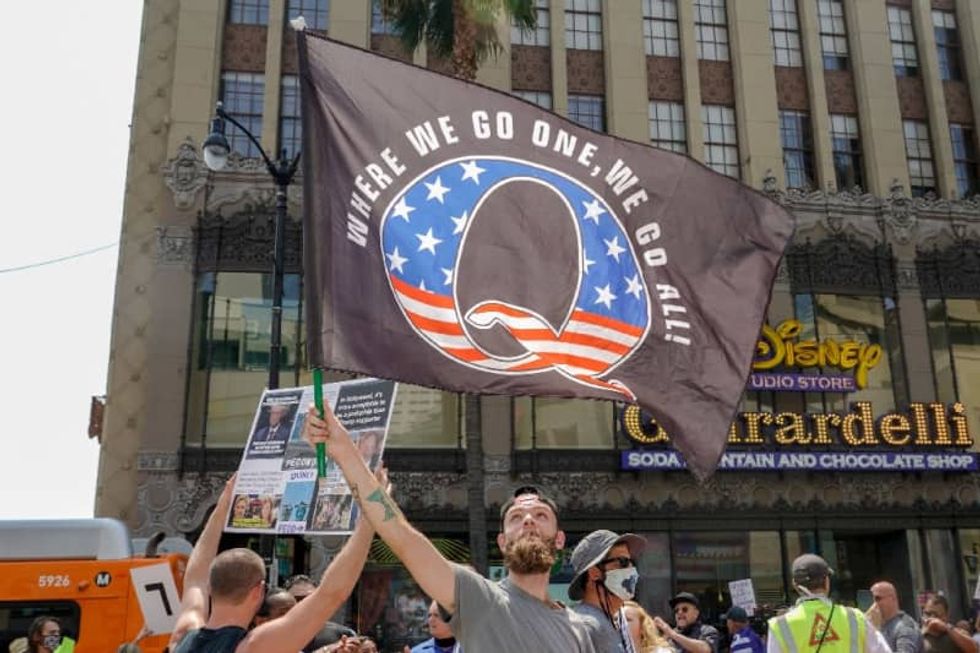 'A perfect storm': Experts worry as QAnon conspiracies go global -- posing 'an incredible threat to public health'