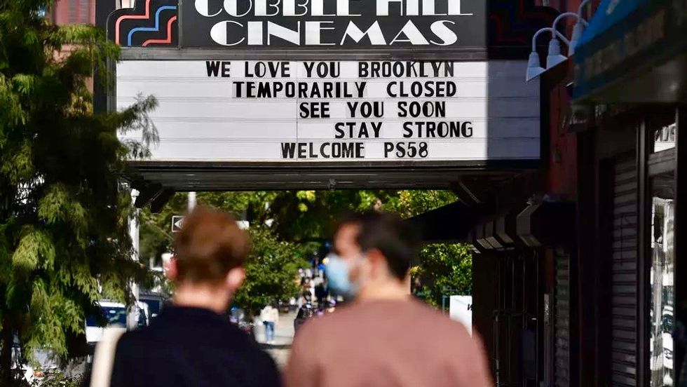 Stifled by pandemic, US movie theaters send SOS