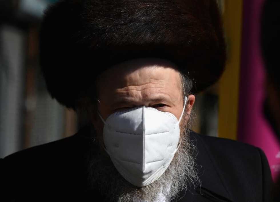 In Brooklyn, Orthodox Jews defiant in face of virus shutdown