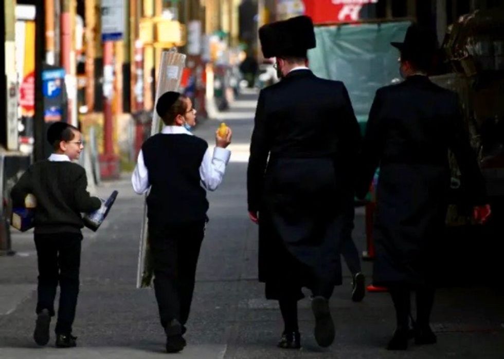 Jewish activist arrested over New York virus protest attack