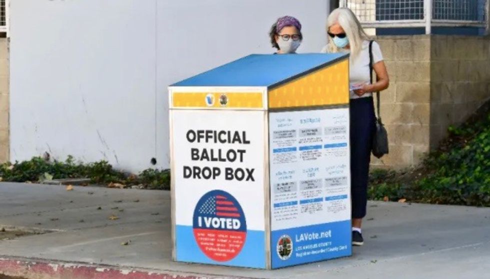 US plows ahead with mail-in voting despite ballot errors