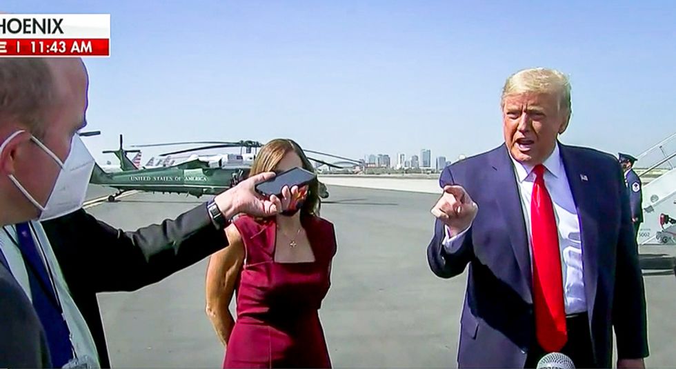 Trump rages at reporters on airport tarmac over futile Biden smear: 'You're a criminal for not reporting it'