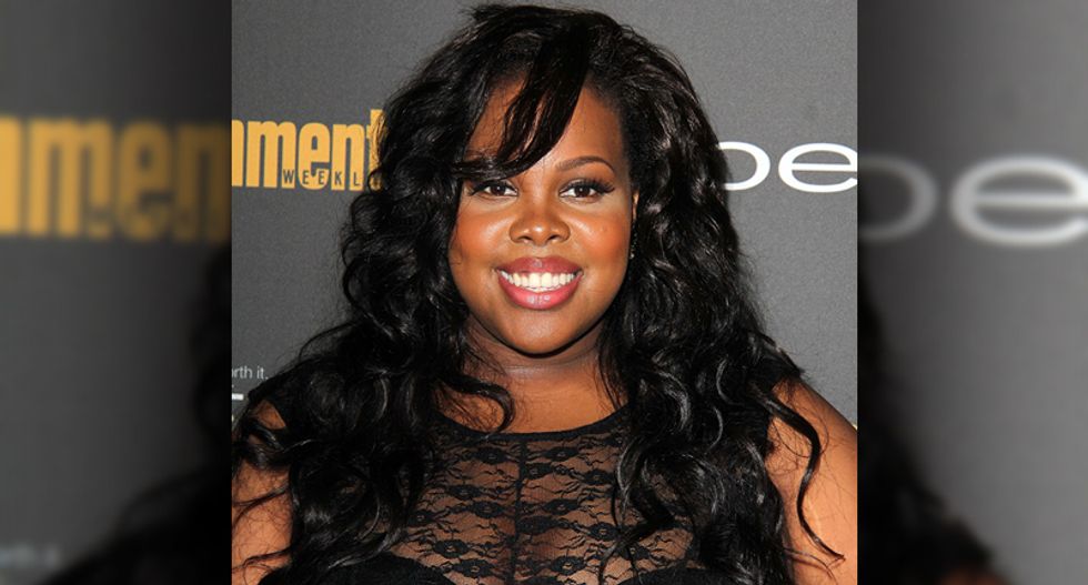 Trump supporter spits on actress Amber Riley's car as she's trying to park