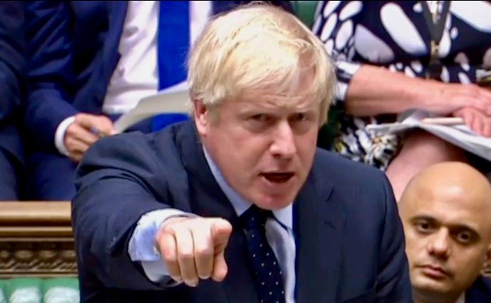 UK's Boris Johnson defiant after court ruling, challenging opposition MPs to call confidence vote in his government