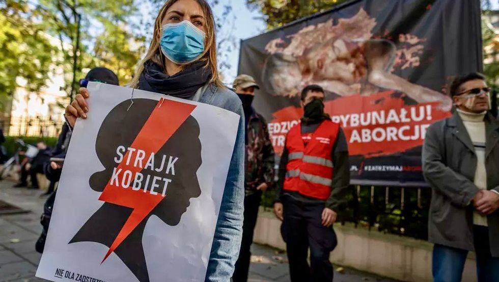 Polish court allows stricter abortion law, sparking outcry