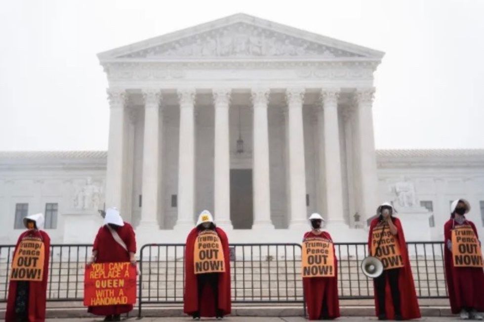 'Shameful power grab': Democrats boycott and progressives protest as GOP votes to send Amy Coney Barrett nomination to senate floor