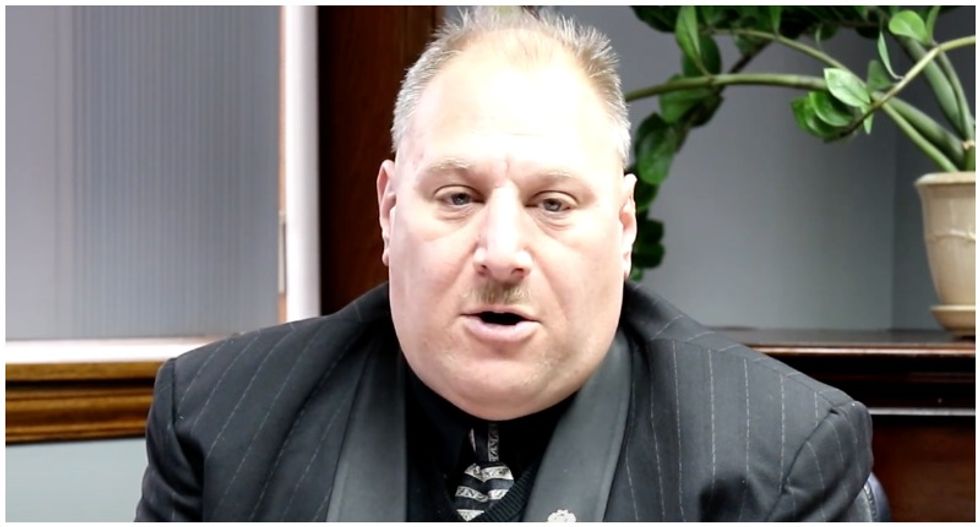 Right-wing Michigan official claims to have police powers after handcuffing woman over BLM stickers